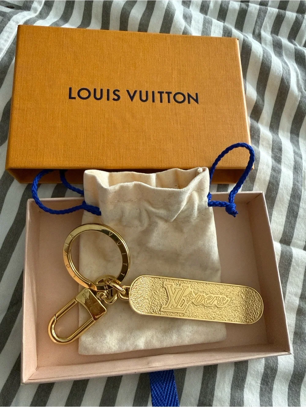 Louis Vuitton Gold Textured Leather Logo & Charm/Key Holder